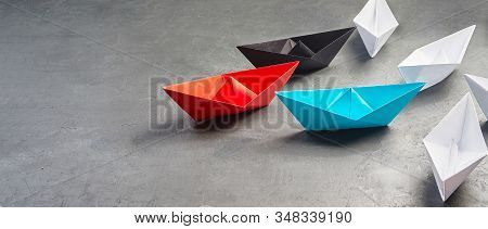 Business Concept, Paper Boat, The Key Opinion Leader, The Concept Of Influence.red,blue And Black Pa