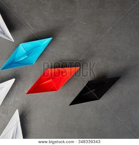 Business Concept, Paper Boat, The Key Opinion Leader, The Concept Of Influence.red.blue And Black Pa