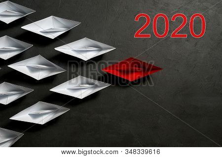 Business Concept, Paper Boat, The Key Opinion Leader, The Concept Of Influence. One Red Paper Boat A