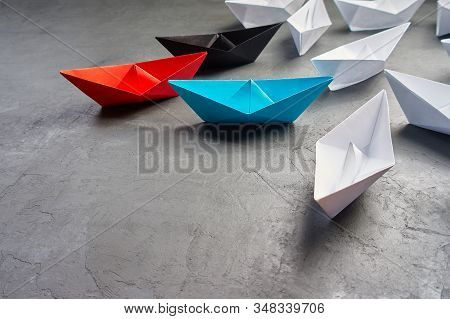 Business Concept, Paper Boat, The Key Opinion Leader, The Concept Of Influence.red,blue And Black Pa