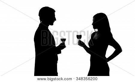 Couple With Glasses Of Wine, Getting Acquainted, Sexy Woman Flirting, Silhouette