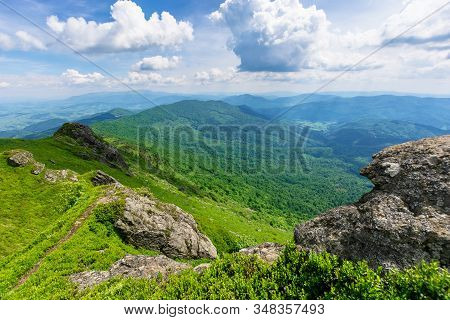 Mountain Landscape In Summer. View From The Top Of Carpathian Watershed Ridge In To The Distance. Bo