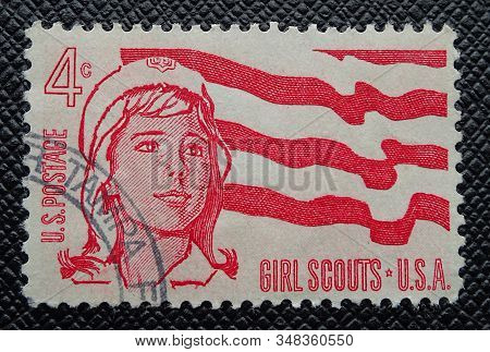 Riga, Latvia - February 1st, 2020: Girl Scouts Post Postage Mail Perforated United States Of America