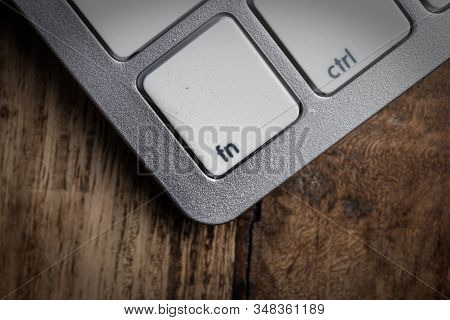 Computer Keyboard - Silver Keyboard Of A Laptop With Button Fn Isolated. Home Office With Portable M
