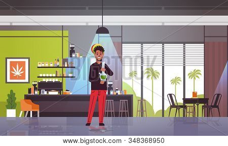 African American Guy Smoking Marijuana With Bong Rastaman Relaxing Cannabis Smoking Hookah System Co