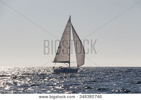 Sailboat At Sunrise During Autumn In Brittany