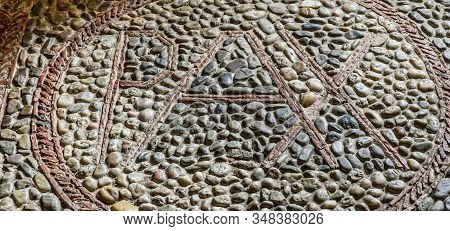 Pax Inscription As A Symbol Of Peace On A Cobbled Ground In Burgos, Spain