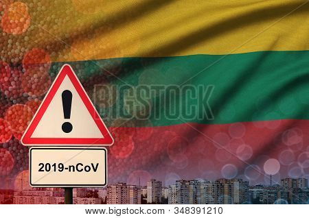 Lithuania Flag And Coronavirus 2019-ncov Alert Sign. Concept Of High Probability Of Novel Coronaviru