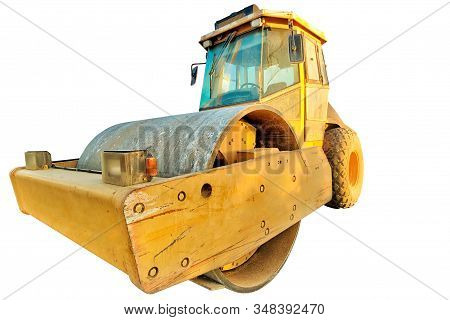 Closeup Of Steamroller Isolated On White Background With Copy Space. Concept Of Work In Progress.