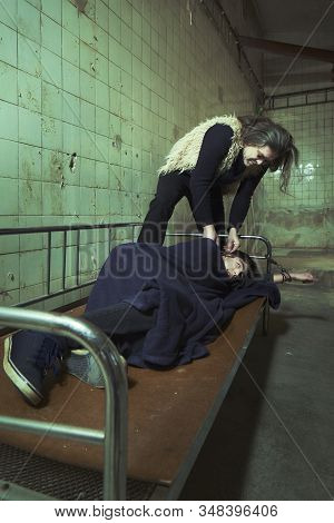 Evil Kidnapper Holding And Controlling Young Man In Horror Place