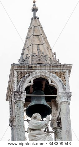 Statue/ Sculpture Under Bell Tower On San Marco Basilica Roman Catholic Church, The South Facade, In