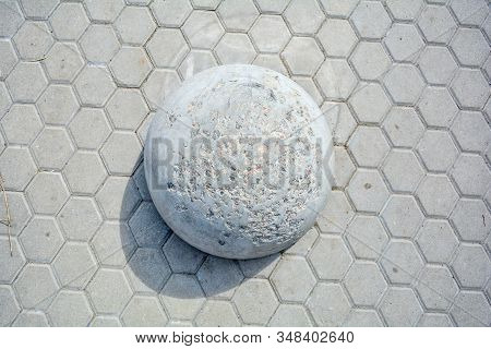 Element Of Sidewalk Design And Protection From Car Parking On Streetwalk Pavement. Top View Of Gray 