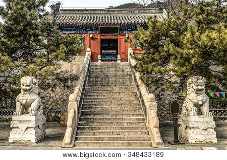 Buildings Of A Fragment Of The Great Chinese Wall In The Mountains Near Bejing