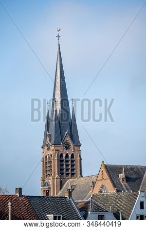 The Steeple Of The Old Church In Breukelen, The Netherlands. Because The Surrounding Houses Are Buil