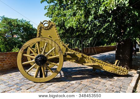 Old Metal Large Gun Painted Brown In Sun