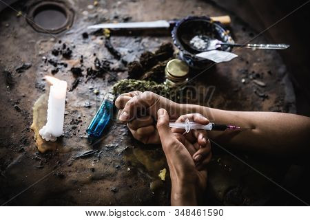 Close Up Teenage Man Is Taking Heroin, Drug Addict, Disease , No To Drugs,the Concept Of Anti Drugs,