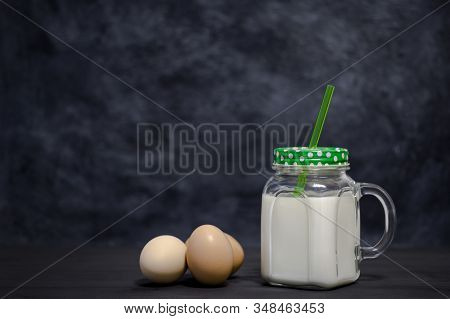 Protein White Cocktail In A Mug And Chicken Eggs On A Dark Background. Background