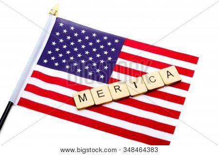 The Flag Of The United States Isolated On A White Background With A Sign Reading Merica