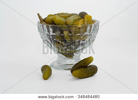 Crystal, Vintage Vase On A White Background. In The Vase Lie Pickles, Cucumbers And Dill Leaves. Thr