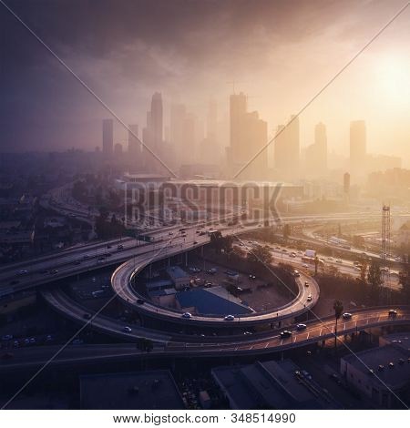 Los Angeles downtown silhouette at foggy sunrise. LAX most famous city of california. Typical view of the Los Angeles.