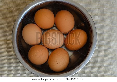 Boiled Chicken Eggs In A Metal Bowl. In A Stainless Steel Bowl, Freshly Boiled Insulated Chicken Egg