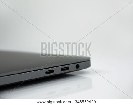 Tipe C Connectors On The Laptop . White Background