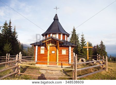 Small Wooden Church Or Chapel In Ukraine Carpathian Mountains