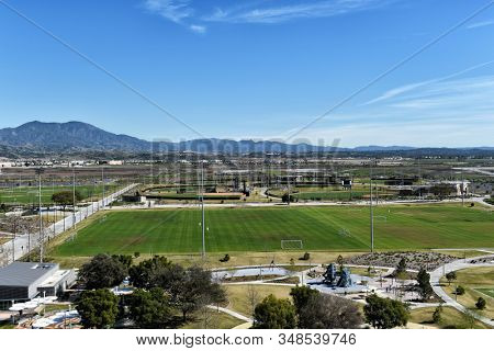 IRVINE, CALIFORNIA - 31 JAN 2020: Aerial view of sports fields at the Orange County Great Park, with Saddleback Peak in the distance.