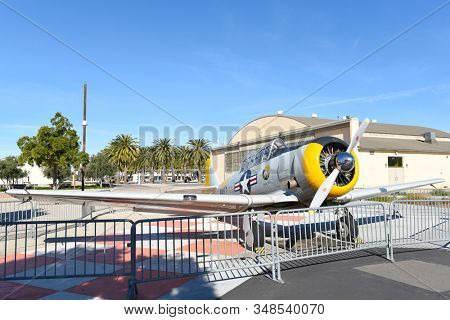 IRVINE, CALIFORNIA 31 JAN 2020: An SNJ-5 Texan WWII era plane on display in front of the hangar and Palm Court at the Orange County Great Park.