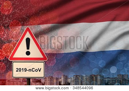Netherlands Flag And Coronavirus 2019-ncov Alert Sign. Concept Of High Probability Of Novel Coronavi