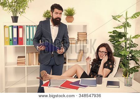Workplace Relations. Business Professionals At Workplace. Working Couple Solve Workplace Problem. Be