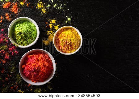 Holi Festival Celebration. Traditional Indian Holi Colours Powder Decoration With Paints. Top View O