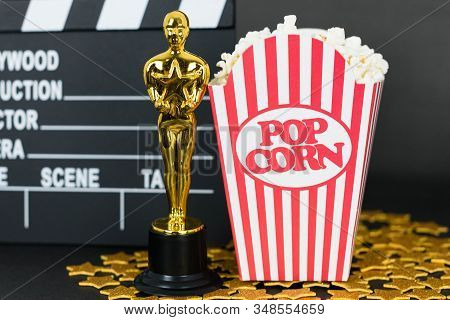 Xalapa, Veracruz, Mexico- January 31, 2020: Clapboard, Oscar Award, Classic Popcorn Box And Golden S