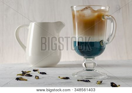 Anchan Butterfly Pea With Coffee And Milk. Anchan Latte