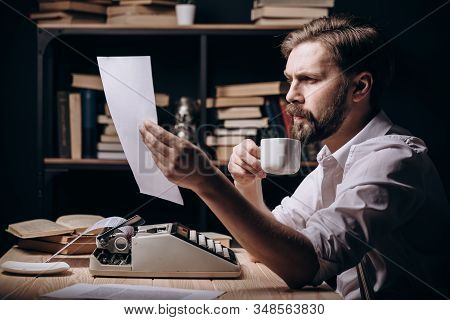 Serious Pensive Penman Reading His Recent Text