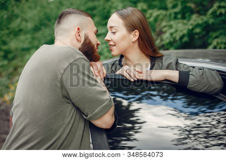 Beautiful Couple Spend Time On A Summer Forest