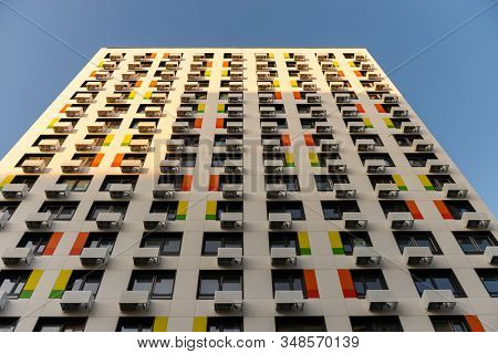 Moscow. Russia. Summer 2019. Multystoried Houses. New Apartment Buildings. The White Facade With Col