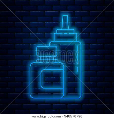 Glowing Neon Line Sauce Bottle Icon Isolated On Brick Wall Background. Ketchup, Mustard And Mayonnai