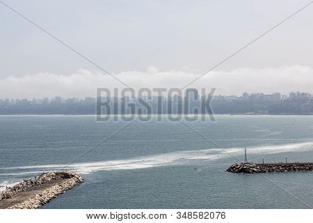 Chorillos, Lima, Peru - May 10, 2016: Looking From Chorillos To The City Of Lima Which Is Covered In