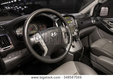 Novosibirsk, Russia - December 18, 2019:  Hyundai Grand Starex - Dashboard, Player, Steering Wheel W