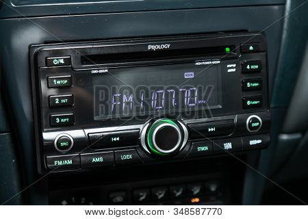 Novosibirsk, Russia - December 06, 2019:  Nissan Almera, Prology Car Dashboard Audio In Fm-receiver,