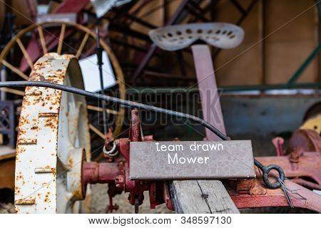 A Piece Of Antique Farming Machinery. An Old And Vintage Team Drawn Mower In The Museum, Kootenays, 