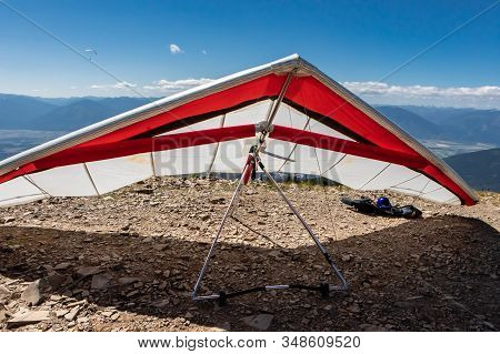Hang Gliders On The Mountain In Creston, British Columbia, Canada. Delta Plane Parked On The Ground.