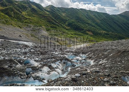 Ice Spring On A Glacier Tongue Flow Down And Transfoms To River Adishchala In Mountains Of Svaneti G
