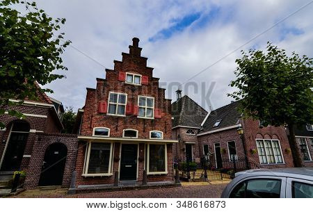 Edam, The Netherlands, August 2019. The Architecture Of The Edam Lodges Is A Characteristic Example