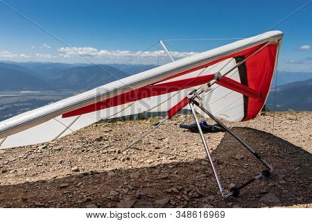 A Lightweight Delta Plane. Paragliders On The Hilltop. Extremal Hobby For Brave People. Active Holid