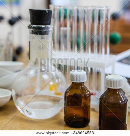image of test tubes and flasks on a table