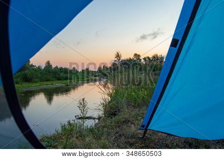 View Of Sunrise, Clear Skies With No Clouds In Colors Blue, Red And Purple Gradient, Sunrise On Rive