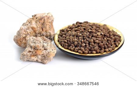Abelmoschus Moschatus Or Ambrette Seed With Natural Ambergris. Isolated On White Background.