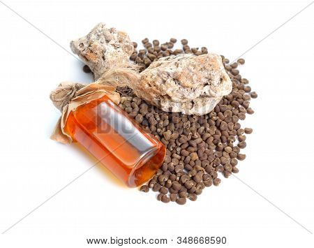 Abelmoschus Moschatus Or Ambrette Seed With Natural Ambergris. Isolated On White Background.